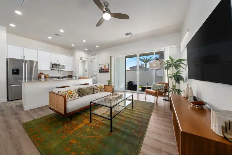A living room with a couch and a table